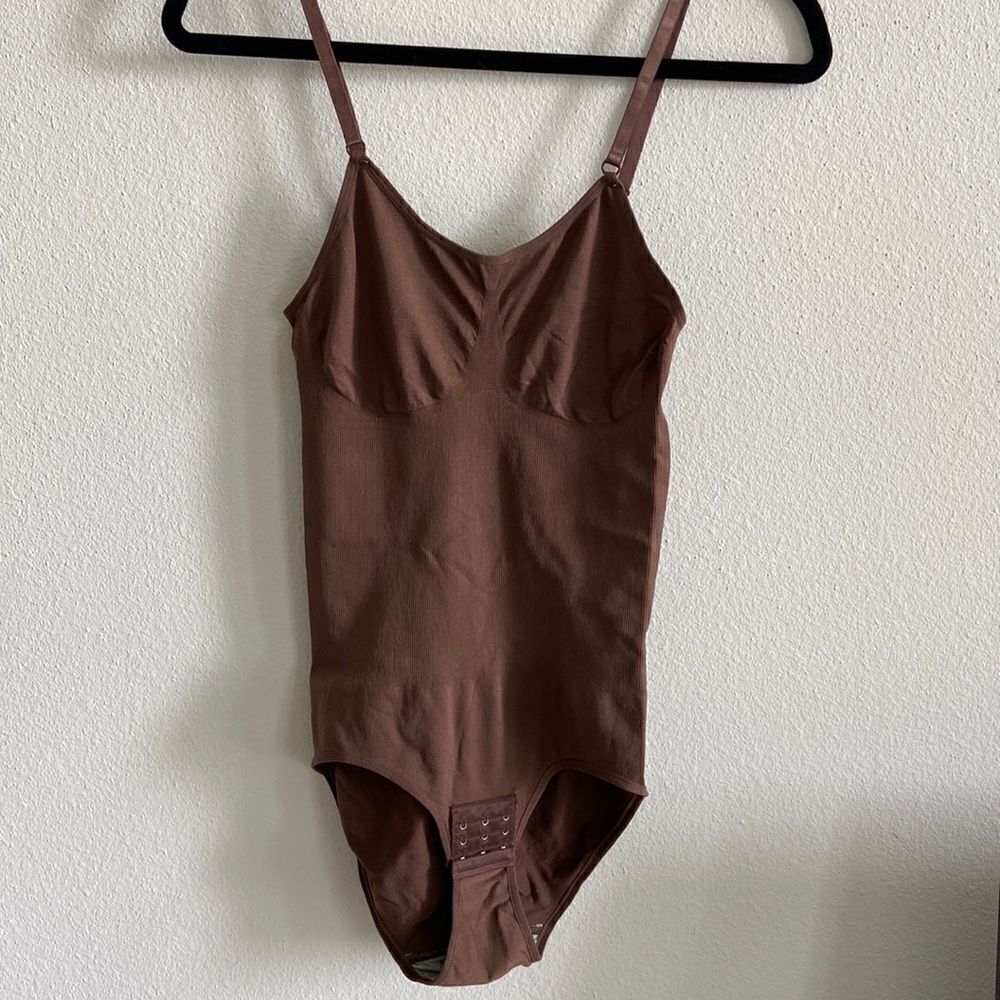 Bodysuit Brown never used straps & bottom closure adjustable